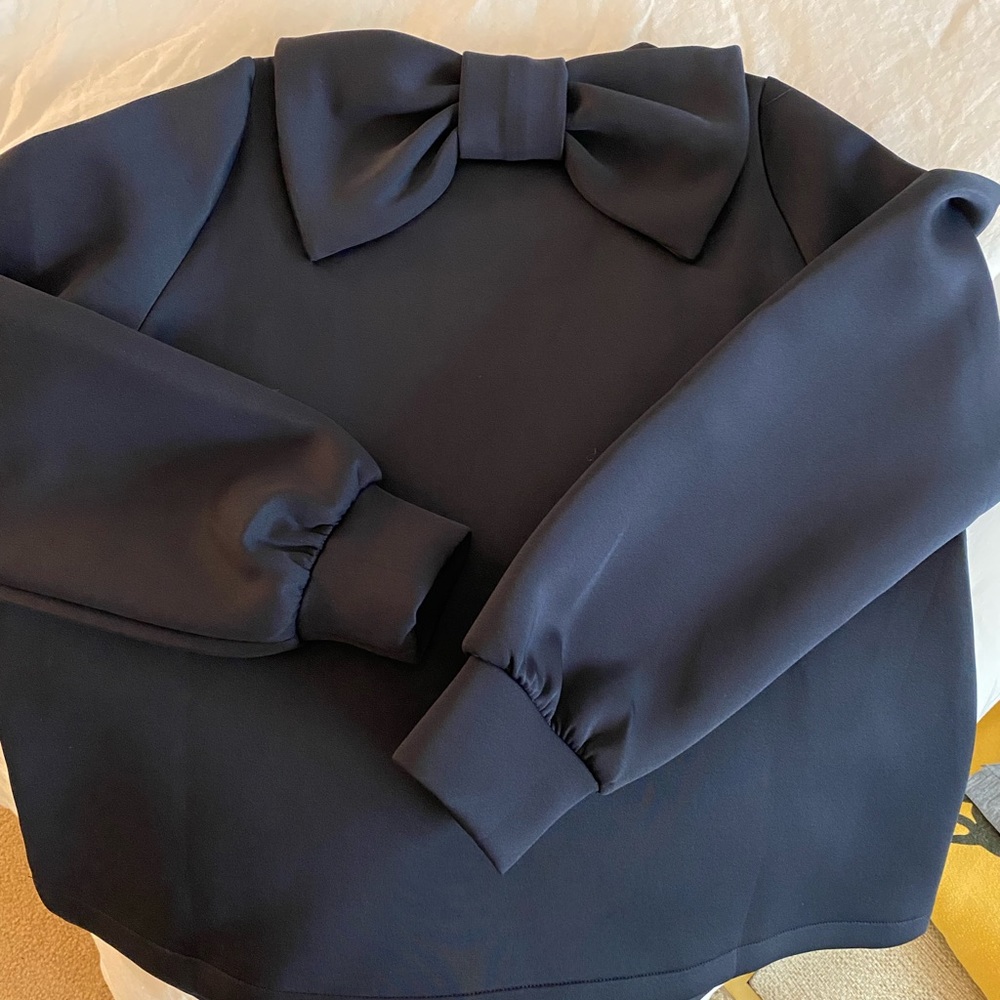 Perfect for the holidays! Navy blue bow shirt